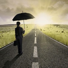 Businesswoman standing on the highway road